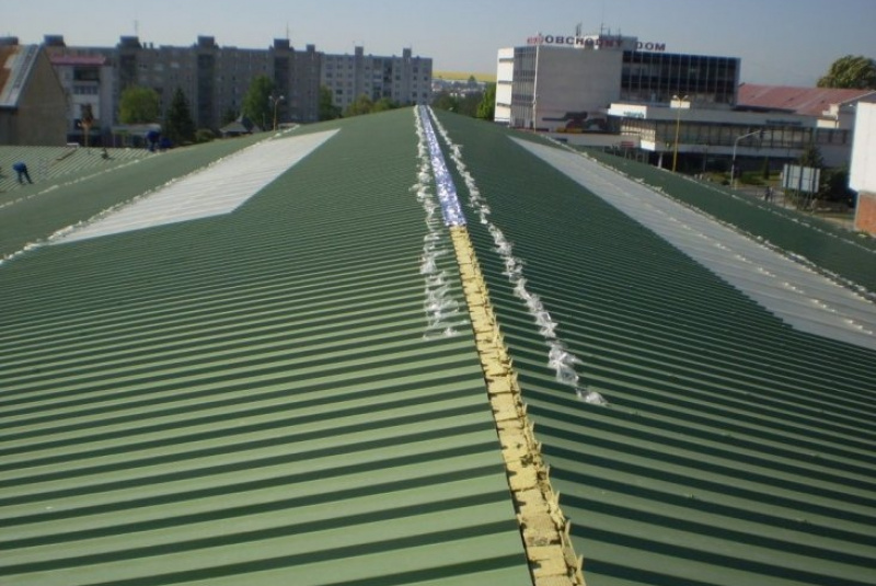  Opláštenie budov / Opláštenie obchodného centra - Sečovce - foto